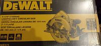 Front of sealed retail box showing DEWALT branding, model DWE575, specifications