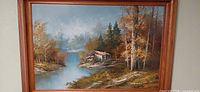Full view of framed oil painting