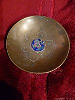 top view showing brass bowl, etched decoration, and colorful cloisonné center