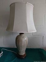 Full view of lamp with shade showing overall design and height