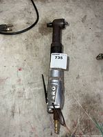 Full view of ARO pneumatic ratchet with 3/8 in. head and brass fitting