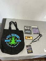 Overall lot with tote bag, two DVDs, Sting pass, Marianas Trench VIP pass
