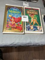 Both Disney VHS tapes side by side