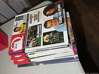 Stack of Q magazines