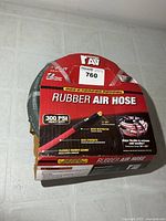 Front of packaged 25-ft rubber air hose