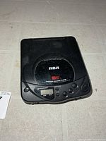 Front view of RCA portable CD player showing controls and branding