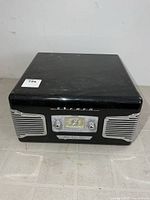 Front and top view of black TEAC stereo displaying overall condition