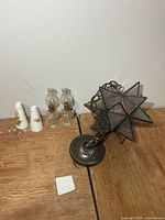 Entire lot showing pendant, two oil lamps, two shakers