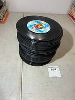 Stack of approx. 70 unsleeved 45-rpm records
