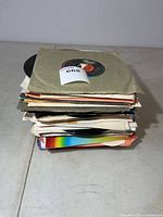 Stack of sleeved 45 rpm records