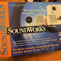 Retail box front showing Creative Cambridge SoundWorks SoundWorks 2.1 speaker system
