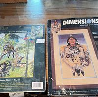 Overview of both sealed cross-stitch kits