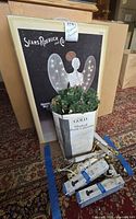 Boxed Sears Roebuck angel, advent calendar tree in sleeve, four window candles, spare bulb packs