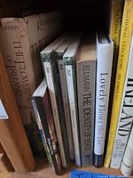 Shelf view showing hardcovers The Flowering of Ireland, The Identity of Yeats, Lovely Flows the Lee, National Geographic Ireland guide