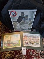 All three prints: Rockwell poster behind, two O'Shea matted prints front