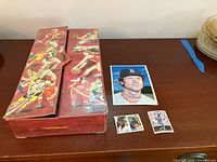 Closed Topps Super Sports Card Locker with sample cards displayed beside it