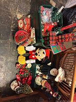 Group shot of all decorations, plush, figurines, ornaments and tote