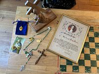 Lot overview showing all devotional items on table