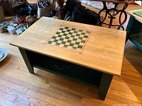 Overall view showing top with chessboard and lower shelf