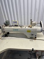 Full view of Leman LM 2010 sewing machine mounted on table