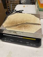 Front view of TEC SL-2200 scale showing worn platform and control panel