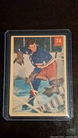 Front of 1954 Parkhurst Dean Prentice rookie card in protective holder