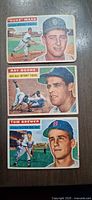 Fronts of three 1956 Topps baseball cards