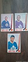 Front view of three 1969 Toronto Maple Leafs O-Pee-Chee cards featuring Johnny Bower, Marv Edwards, Brit Selby