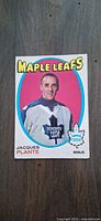 Front of 1971-72 O-Pee-Chee Jacques Plante Maple Leafs hockey card
