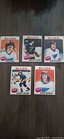 Fronts of five 1975-76 O-Pee-Chee St. Louis Blues cards