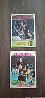 Front view of both Phil Esposito hockey cards