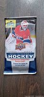 Front view of sealed Upper Deck 2013-14 Series 1 Hockey card pack