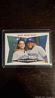 Front view of Baby Blue Jays baseball card in protective sleeve