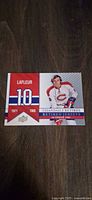 Front view of Guy Lafleur Retired Jerseys SP card showing design, player image, number 10, years 1971-1985