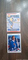 Fronts of both Mats Sundin rookie cards in sleeves