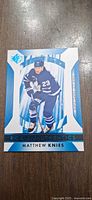 Front view of Matthew Knies Rookie Authentics card