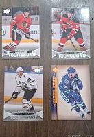 All four Young Guns hockey cards displayed together