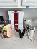 All boxed and loose items together on countertop