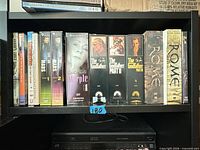Front spines of all DVD box sets on shelf