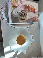Boxed rabbit platter set resting on Deruta platter with frosted glass flower bowl nearby