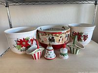 Full lot view showing two planters, bowl, two baskets, two bells