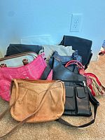 Group shot of all ten handbags arranged together