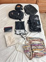 Overview of all bags laid on bed