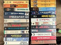 Two stacks of VHS tapes showing spines and titles