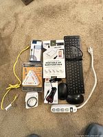 All nine items laid out on carpet