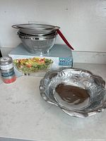 Full lot showing decorative rabbit bowl, nested strainers, salt tins and MKI box