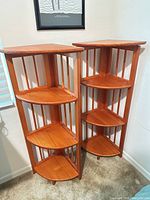 Pair of assembled corner shelf units showing overall appearance and finish