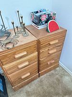 Pair of oak veneer file cabinets closed view