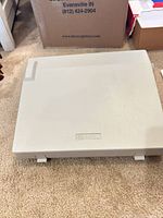 Closed dust cover showing Smith Corona logo