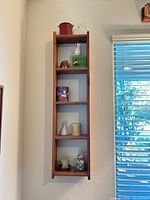 Full view of wall shelf with all contents displayed